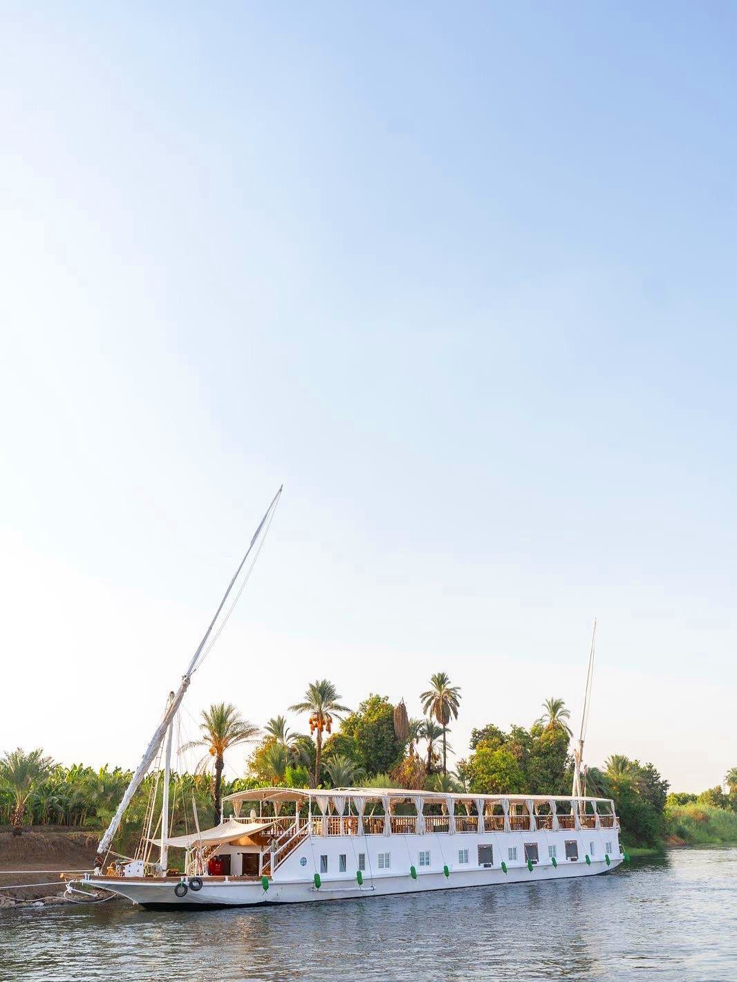 A traditional dahabiya sailing on the Nile